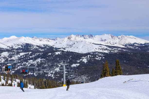 Skiing at Copper Mountain in winter of the Colorado Rocky Mountains Copper Mountain ski resort chair lift and panorama tenmile range stock pictures, royalty-free photos & images