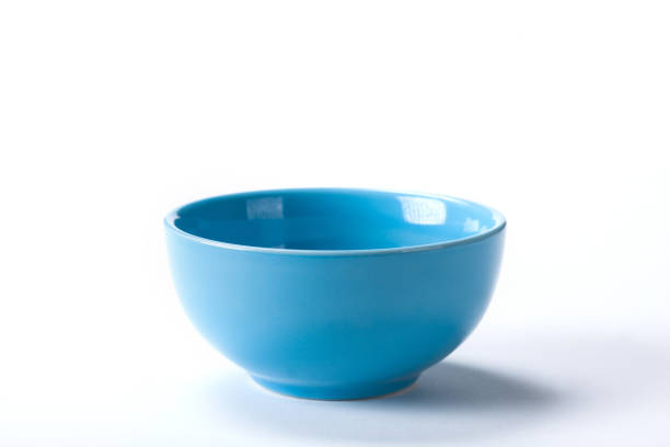 istock Close up Ceramic blue bowl isolated on white background shoot in the studio with space for copy. 1154905014