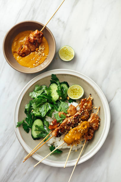 istock Thai chicken satay with peanut sauce 1154908202