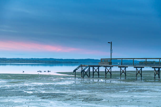 Blue Sunrise Waterscape with Wharf