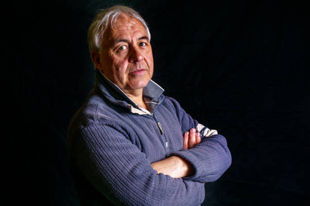 istock Mature man grinning portrait close-up 1154912140