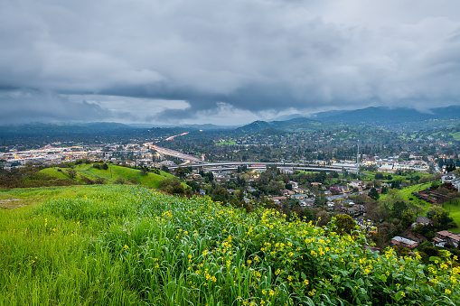 A view of Mount Diablo and the China Wall during a cloudy spring day in Walnut Creek, California