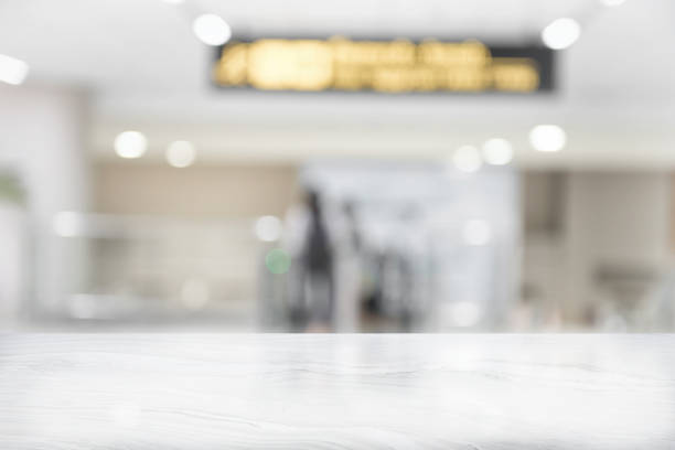 istock White marble table top on blur coffee shop 1154916445