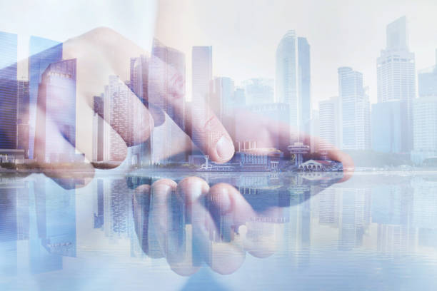 istock closeup of hands using smartphone, double exposure 1154919288