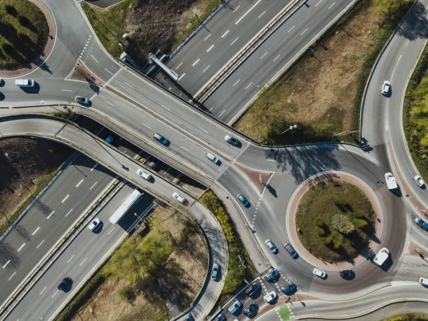 istock aerial top down view of junction intersection, transportation 1154919398