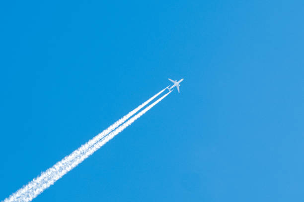 istock Jet Aeroplane against a Blue Sky 1154921807