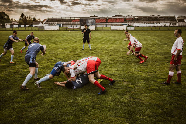 istock Intense rugby match on a stadium! 1154922210