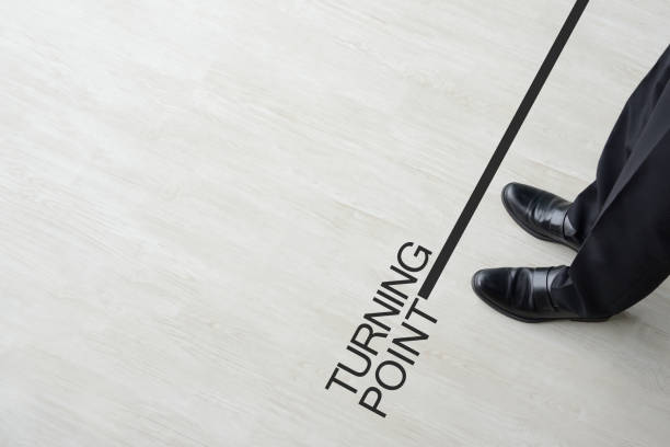 istock Business man standing on turning point 1154925440