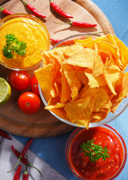 istock Composition with bowl of tortilla chips. 1154925649