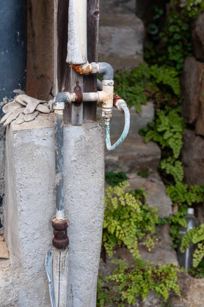 istock Old plumbing in a hilly town 1154930200