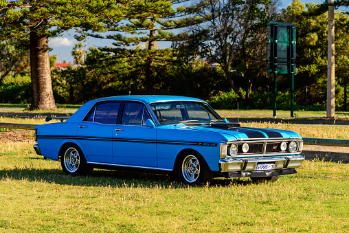Port Adelaide, South Australia - October 14, 2017: Iconic Australian made Ford Falcon 351-GT parked on the grass on a day
