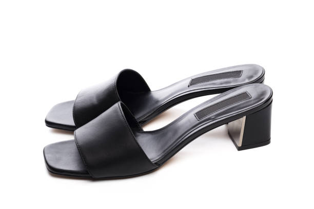 istock Womans summer  leather sandals isolated on white background - Image 1154936290