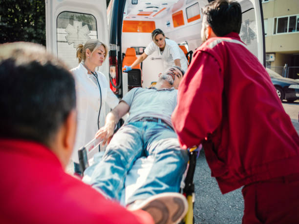 istock Paramedic team pushing stretcher 1154938864