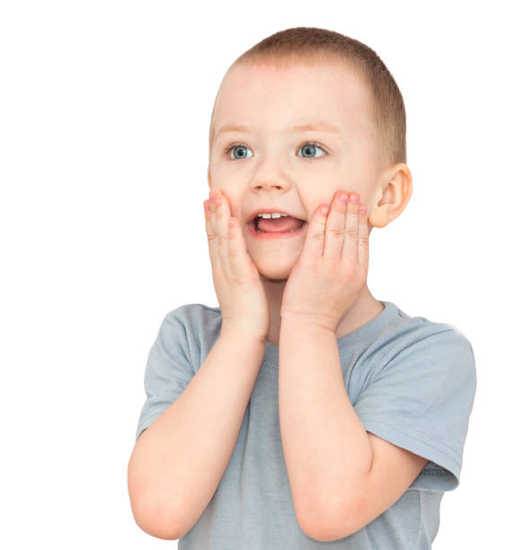 istock happy little  child smiles isolated on a white background 1154940330