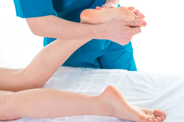 istock Patient at the physiotherapy doing physical exercises with his therapist 1154942118