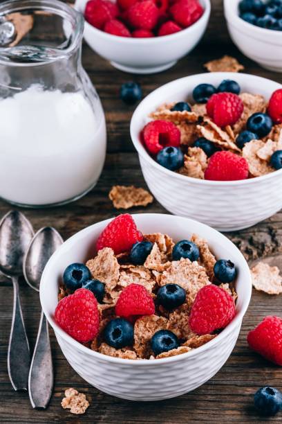istock Whole Grain cereals with fresh blueberries and raspberries for breakfast. 1154946165