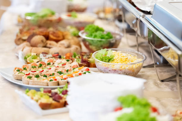 istock Catering served table with delicious food snacks. 1154947729