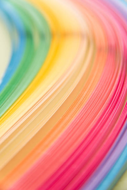 istock Paper strips in rainbow colors as a colorful backdrop 1154950104