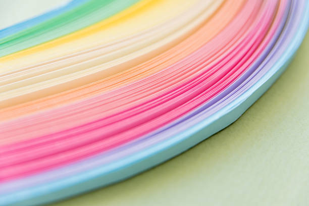 istock Paper strips in rainbow colors as a colorful backdrop 1154950239