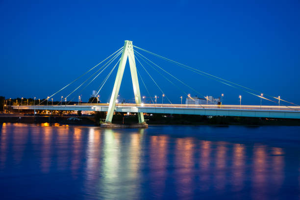 istock Illuminated bridge accross the river Rhein in Cologne 1154950418