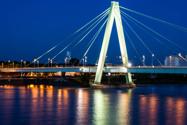 istock Illuminated bridge accross the river Rhein in Cologne 1154950430