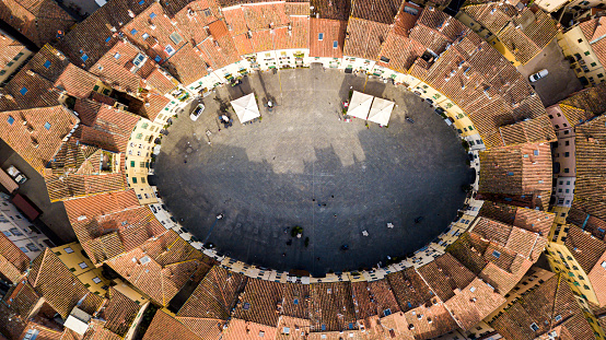 Drone aerial view of Piazza dell' Anfiteatro in Lucca Italy Piazza dell'Anfiteatro is a public square in the northeast quadrant of walled center of Lucca
