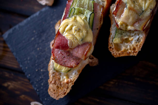 istock homemade toast, with bacon,cucumber and cheese 1154950617