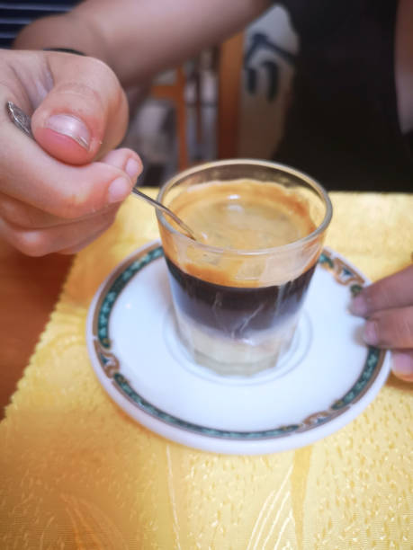 istock cup of coffee with plate and spoon 1154951640