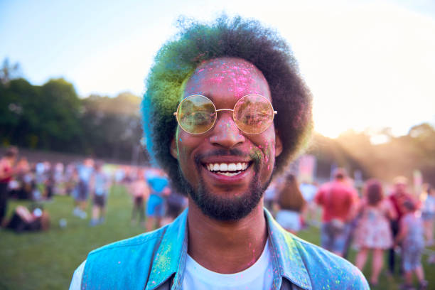 istock Smiling African man in holi colors 1154951898