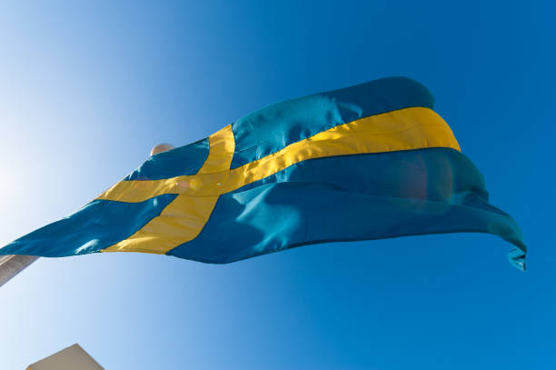 istock Swedish flag blowing in the wind. 1154951918