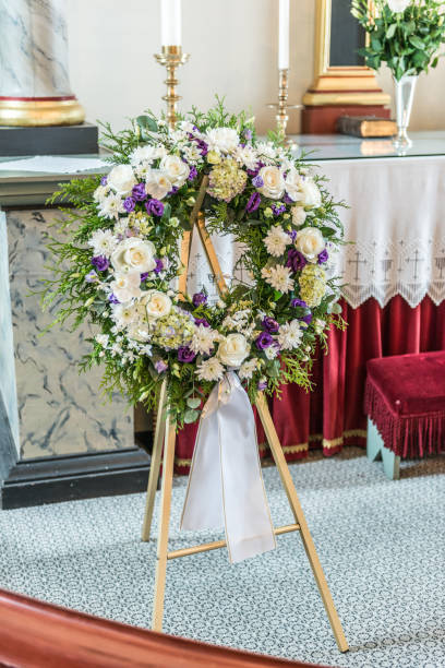 Sympathy Wreath at a funeral in a church. Sympathy Wreath at a funeral in a church. Funeral stock pictures, royalty-free photos & images