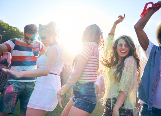 istock Friends during good party with multi colors 1154953550