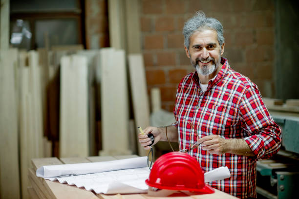 istock Mature manager analyzing design of a new project in a workshop 1154956268