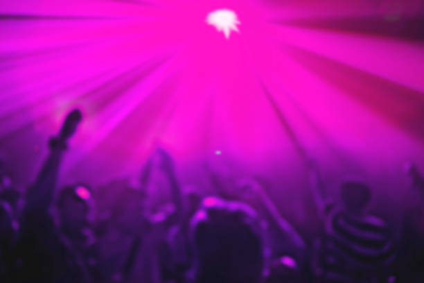 istock Blur Silhouettes shadow having fun in a club party. background with copy space. 1154956506