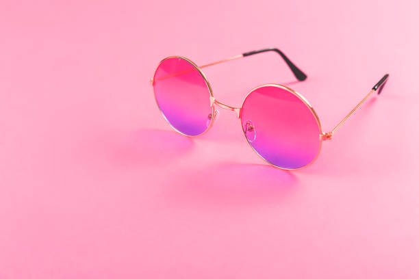 istock Round summer duotone sunglasses on pink background. 1154956564