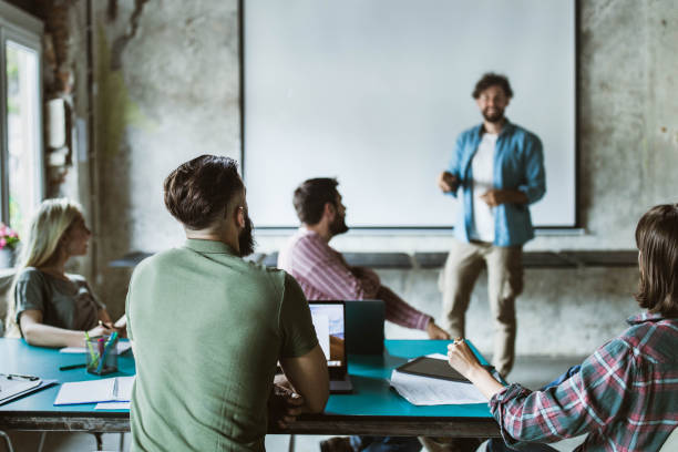 istock Presentation on a meeting at casual office! 1154957973