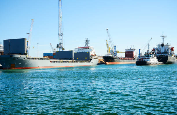 Ship and tugboat in the harbor
