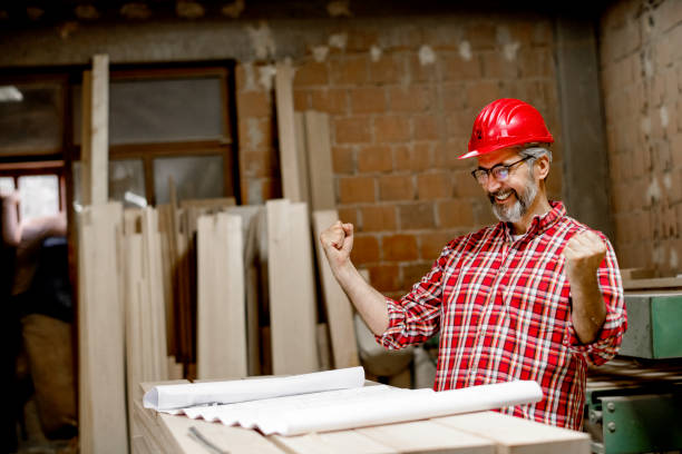 istock Senior quality inspector checking production line 1154959254
