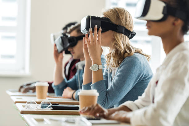 istock selective focus of multiethnic students using vr headsets in university 1154963781