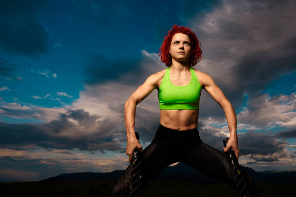 istock sportive woman exercising 1154966760