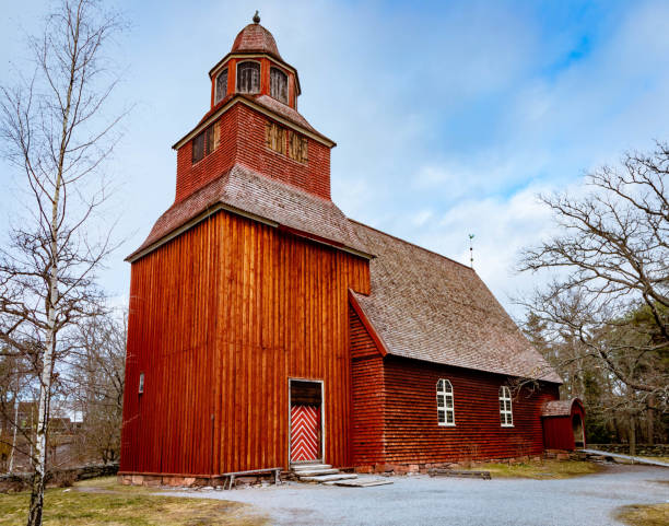 istock Old wooden red church 1154970761