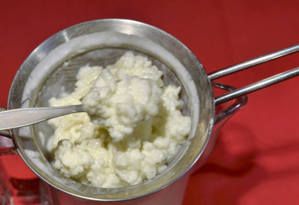 istock Pouring of the Kefir 1154971822