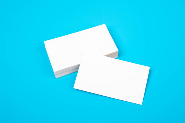 istock Business card, white clean on blue background. 1154973384