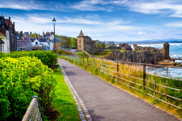 St Andrews, Scotland - May 09,2019:The scenic path on the cliff leading to the city and the ruin of the St Andrew's Castle, located on a rocky promontory,  Fife, Scotland, UK
