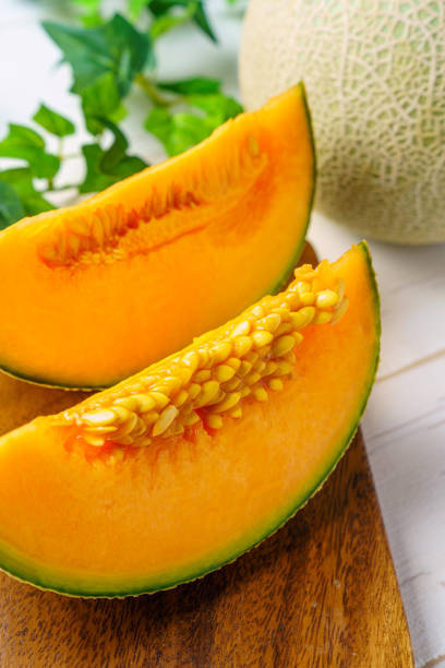 istock Whole and sliced of melons 1154979032