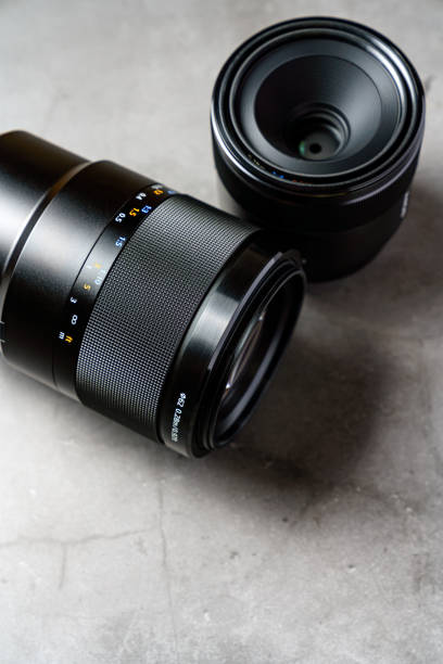 istock Close up of camera lens on a dark background 1154980285