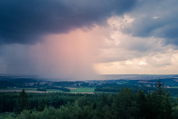 istock Stormy evening weather over rolling hills 1154980338