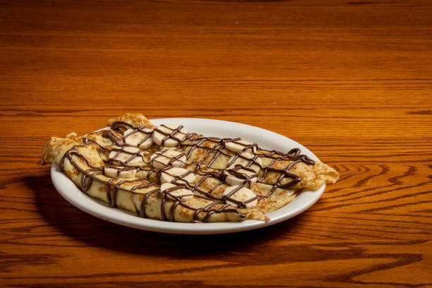 istock banana chocolate crepe restaurant food 1154985493
