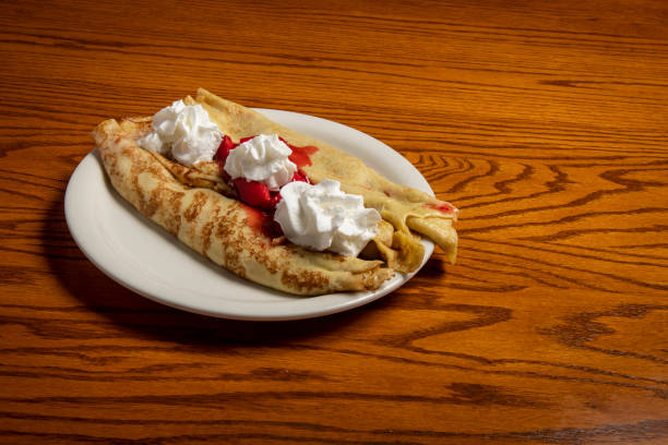 istock strawberry crepe restaurant food 1154985523