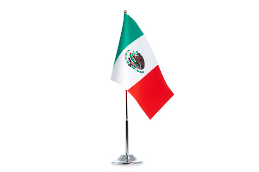 Mexican flag stands on a white background